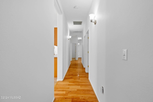 hall featuring light hardwood / wood-style floors