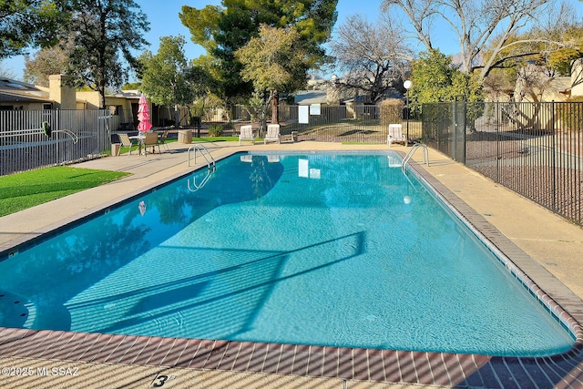 view of pool featuring a patio area