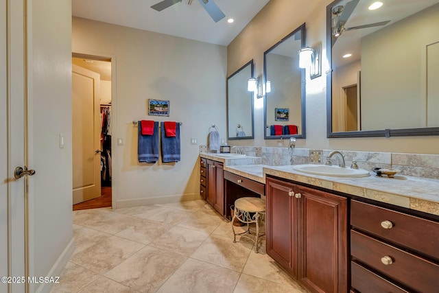 bathroom featuring ceiling fan, tile patterned flooring, and vanity