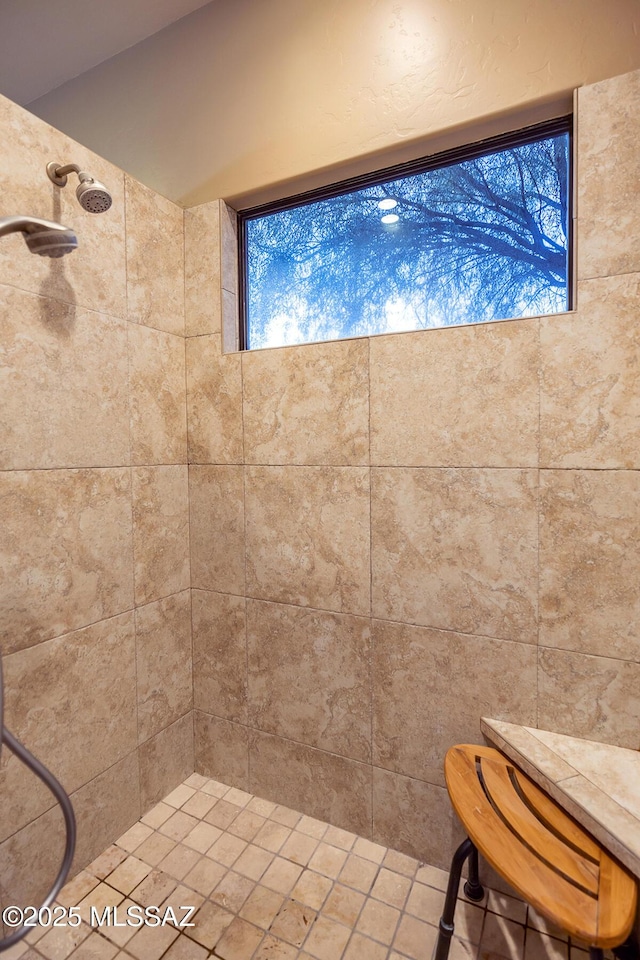 interior space with a tile shower