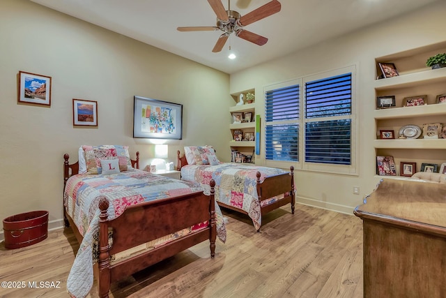 bedroom featuring ceiling fan and light hardwood / wood-style floors