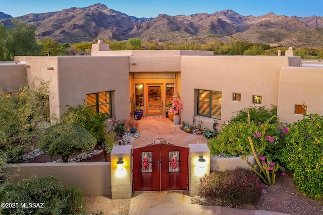 view of front of house with a mountain view