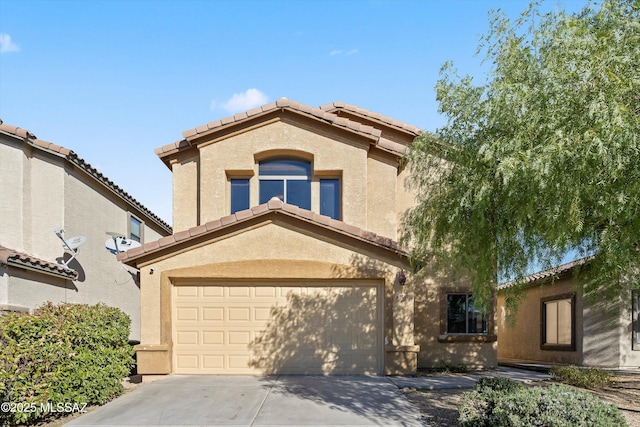 7585 E Majestic Palm Ln, Tucson, AZ 85756 - mediterranean / spanish-style home featuring a tiled roof, stucco siding, a garage, and concrete driveway
