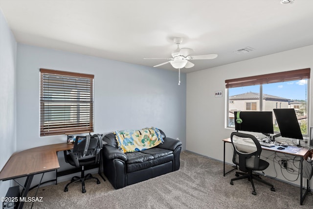 7585 E Majestic Palm Ln, Tucson, AZ 85756 - carpeted home office with a ceiling fan