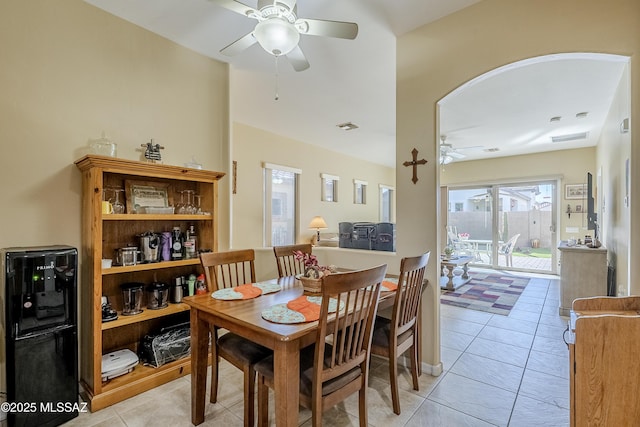 dining room with ceiling fan and light tile patterned floors