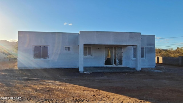 rear view of property with a patio area