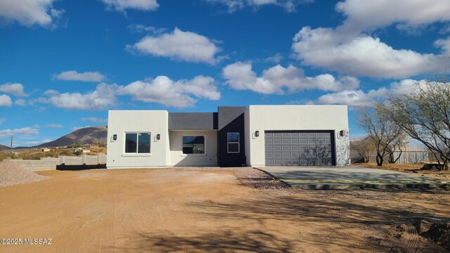 view of exterior entry featuring a patio area