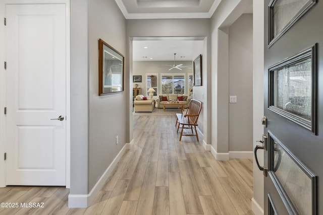 foyer entrance featuring ceiling fan and light hardwood / wood-style flooring