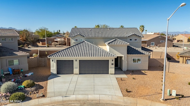 view of front of property with a garage