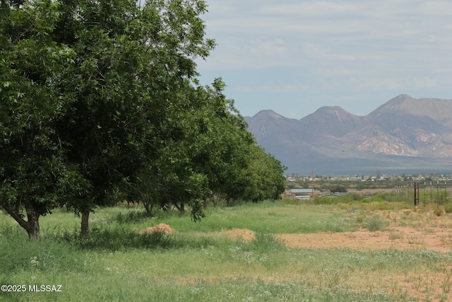 property view of mountains featuring a rural view