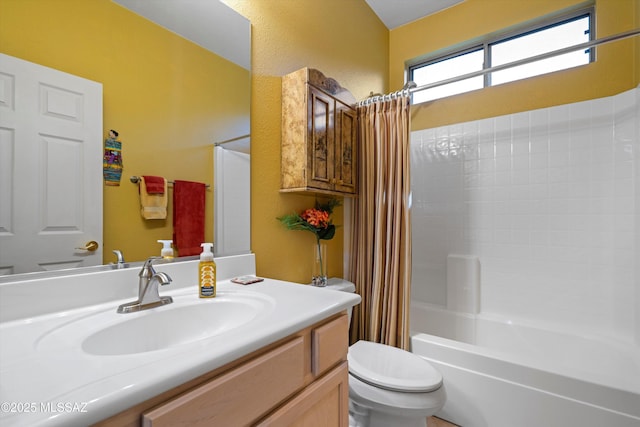 full bathroom featuring vanity, toilet, and shower / bath combo with shower curtain