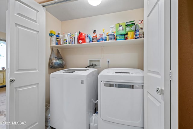 washroom with washer and dryer