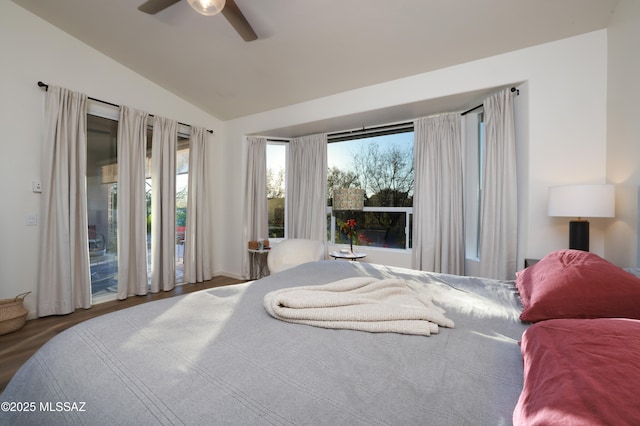 bedroom featuring vaulted ceiling, ceiling fan, and hardwood / wood-style flooring