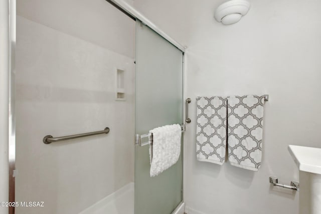 bathroom with walk in shower