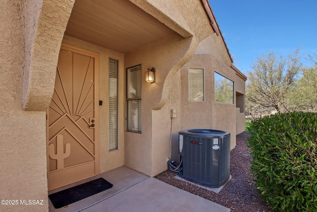 property entrance featuring central AC