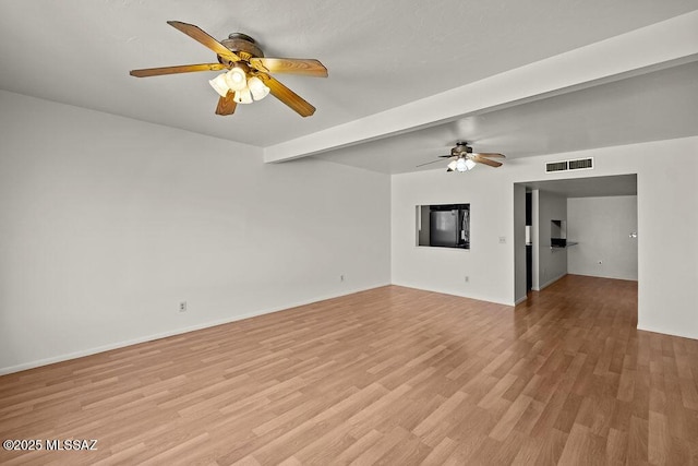 unfurnished living room with beamed ceiling, light hardwood / wood-style flooring, and ceiling fan