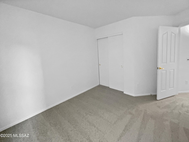 empty room featuring carpet floors