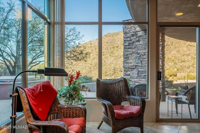 sunroom / solarium with a healthy amount of sunlight