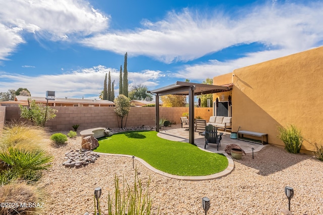 view of yard with outdoor lounge area and a patio area