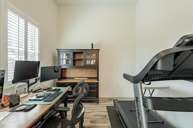home office featuring light wood-style flooring