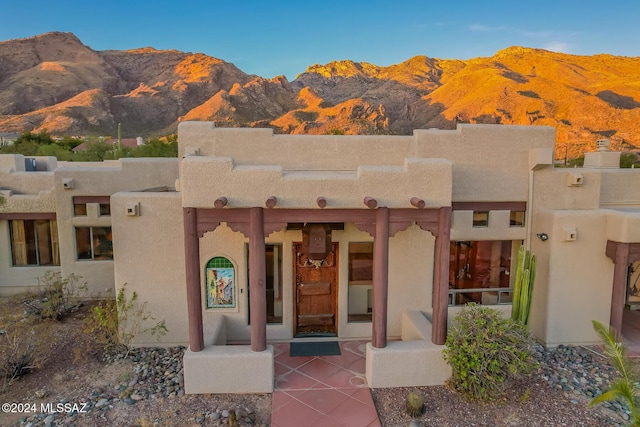 property entrance with a mountain view