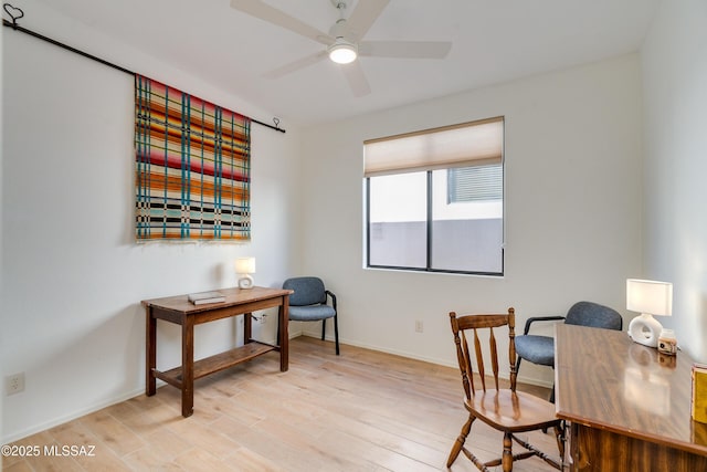 office area featuring light hardwood / wood-style floors and ceiling fan