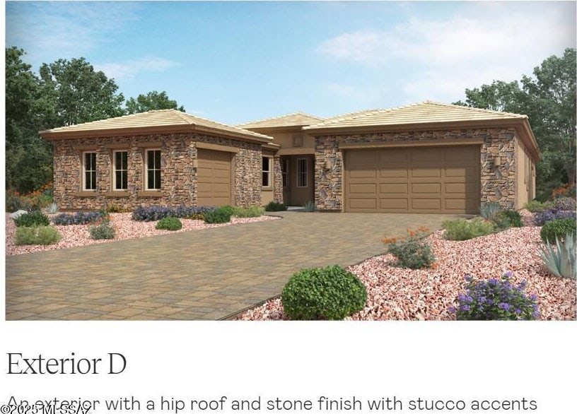 prairie-style home featuring a garage