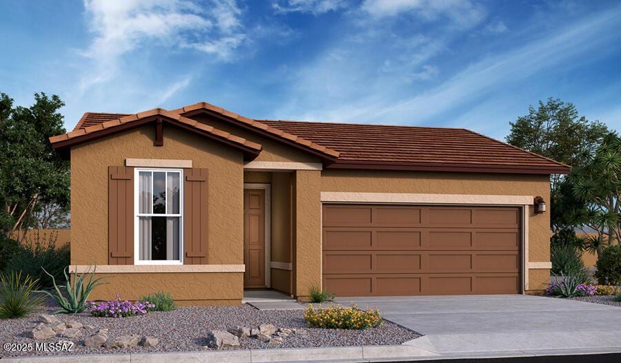 ranch-style house featuring a garage