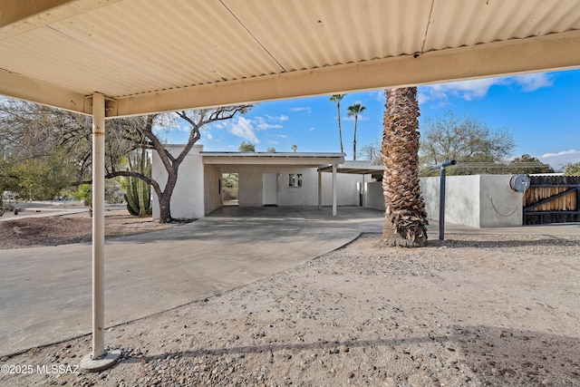 view of patio / terrace with a carport