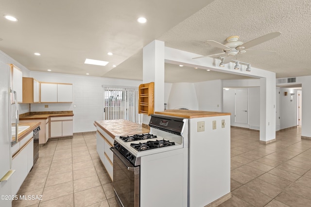 kitchen with dishwasher, white cabinetry, a center island, and white range with gas cooktop