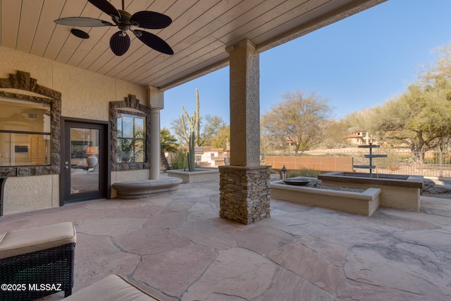 view of patio with ceiling fan