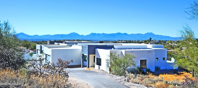 exterior space with a mountain view