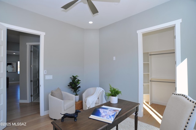 office space featuring hardwood / wood-style flooring and ceiling fan