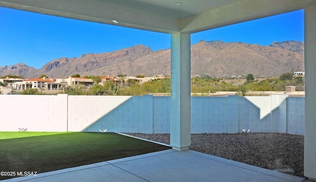 view of patio with a mountain view