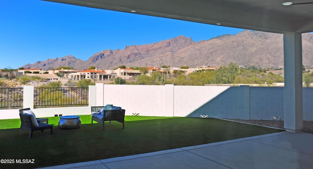 view of patio / terrace with a mountain view