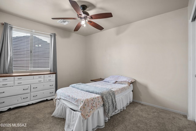 carpeted bedroom with ceiling fan