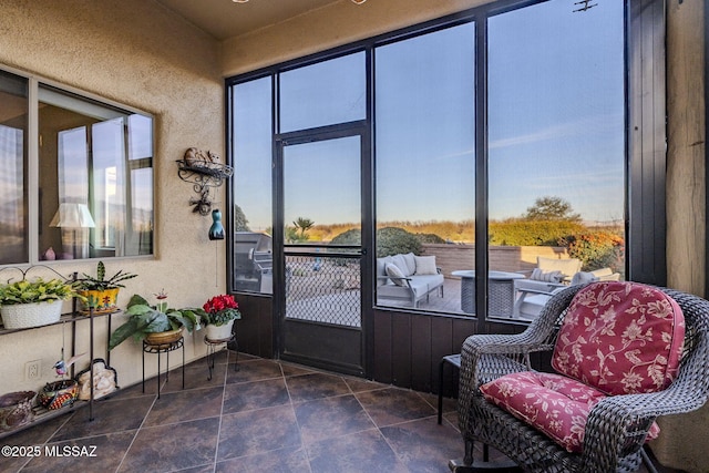 sunroom featuring a wealth of natural light