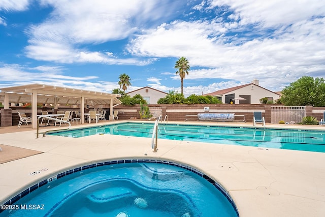 community pool with a patio, a pergola, fence, and a hot tub