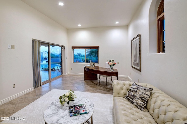 living room with light tile patterned flooring