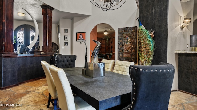 dining room with a notable chandelier