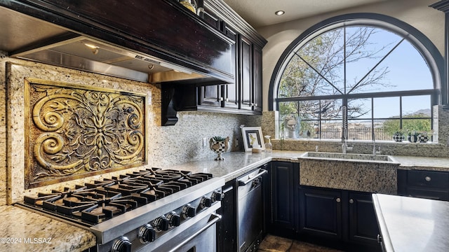 kitchen with premium range hood, tasteful backsplash, high end stove, and sink