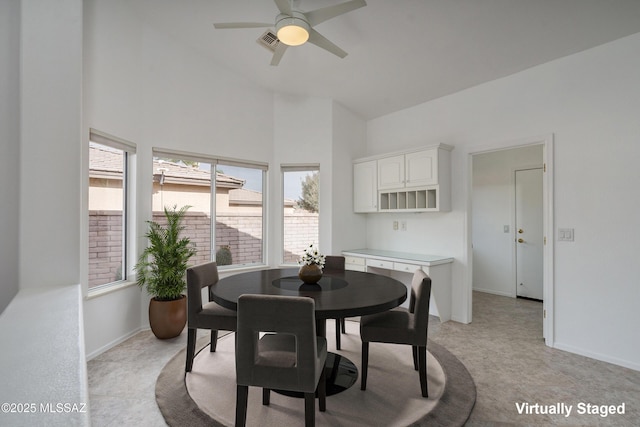 dining space featuring ceiling fan