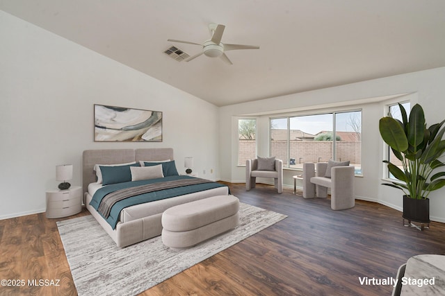 bedroom featuring ceiling fan, vaulted ceiling, and dark hardwood / wood-style floors