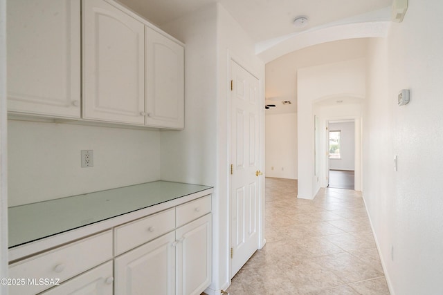 interior space featuring white cabinets