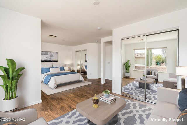 unfurnished bedroom featuring dark wood-type flooring