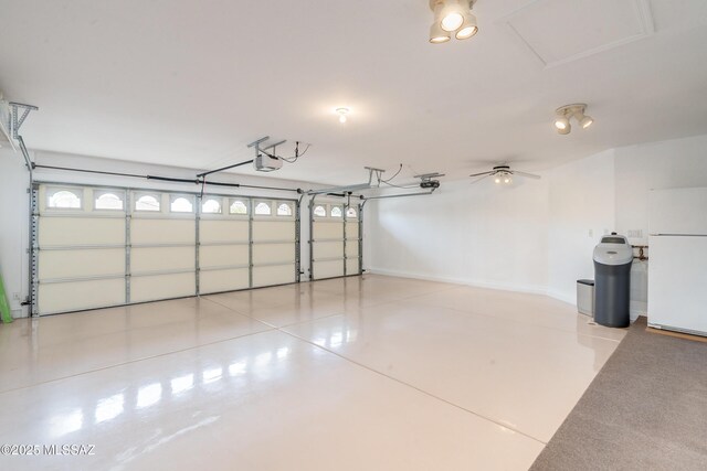 unfurnished sunroom with ceiling fan