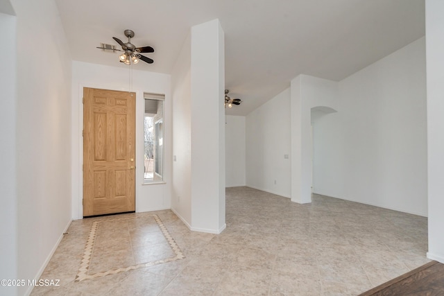 entrance foyer with ceiling fan