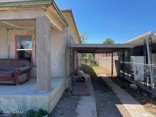 view of home's exterior with a carport