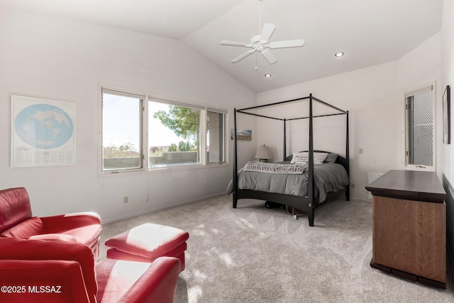 carpeted bedroom featuring vaulted ceiling and ceiling fan