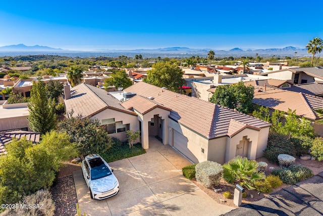 bird's eye view with a mountain view